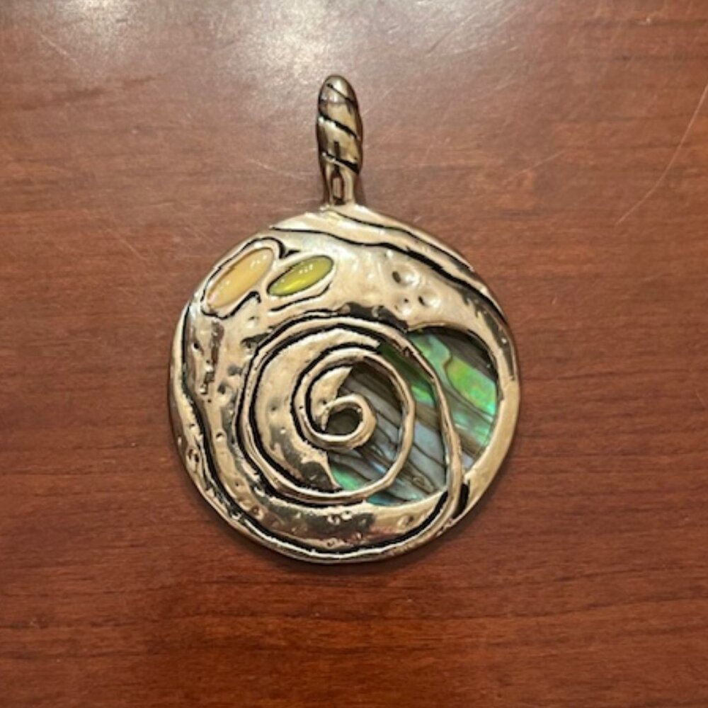Unique silver toned with inlay jewels swirl pendant
